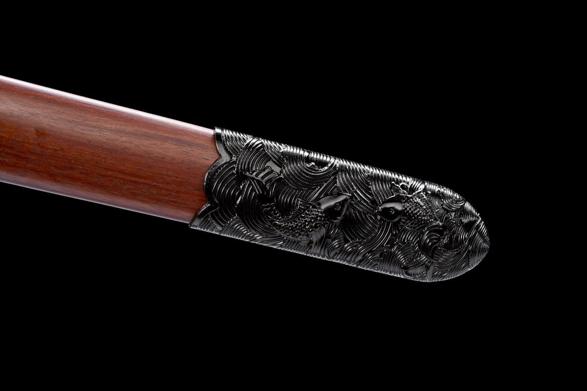 Dark sculpted dragon and wave design on the Black Dragon Jian scabbard end fitting
