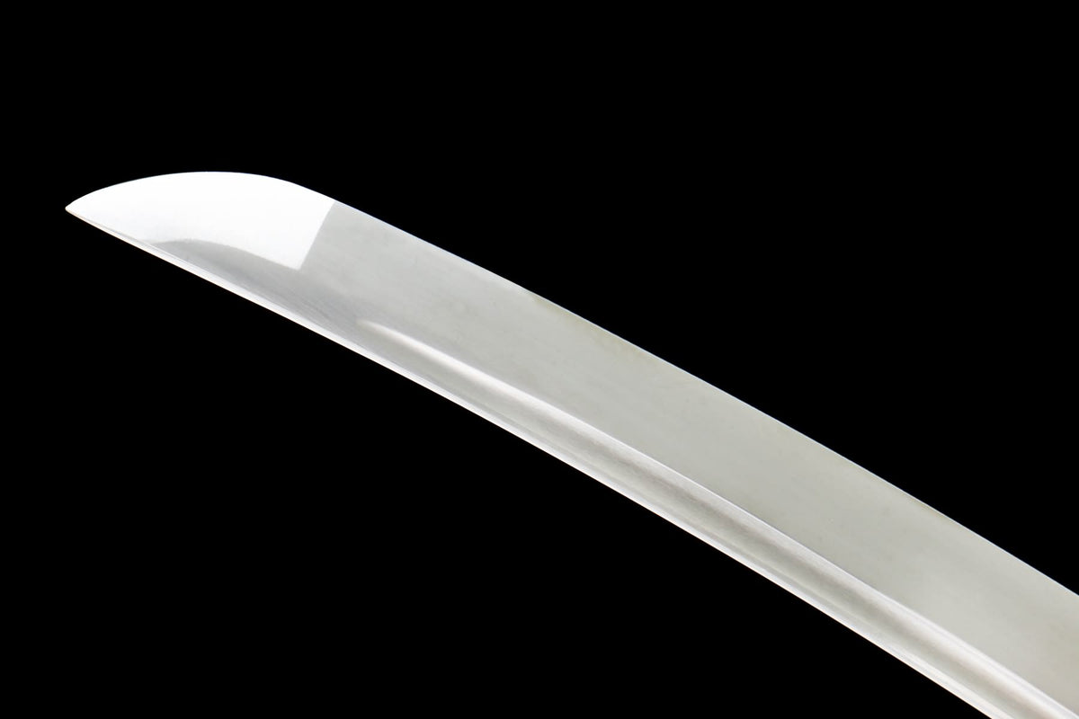 Close-up of the polished curved Tachi blade and pointed tip
