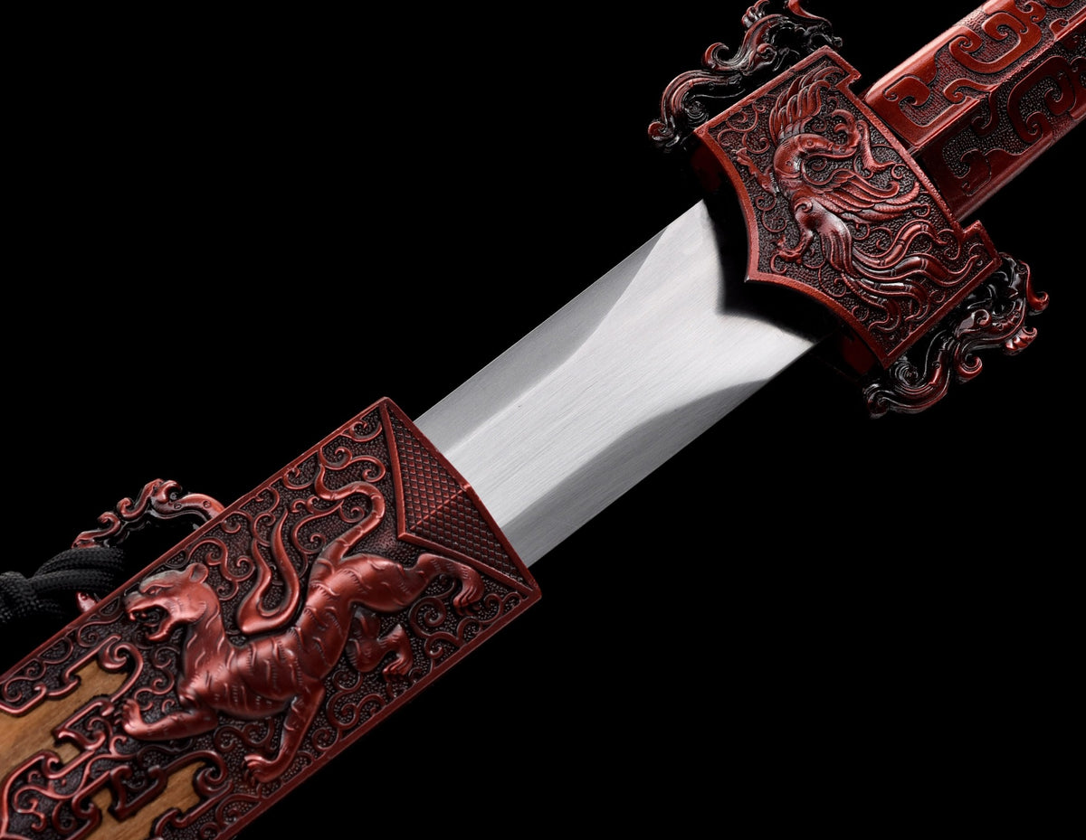 Four Beasts Han Jian sculpted alloy guard and matching scabbard fitting