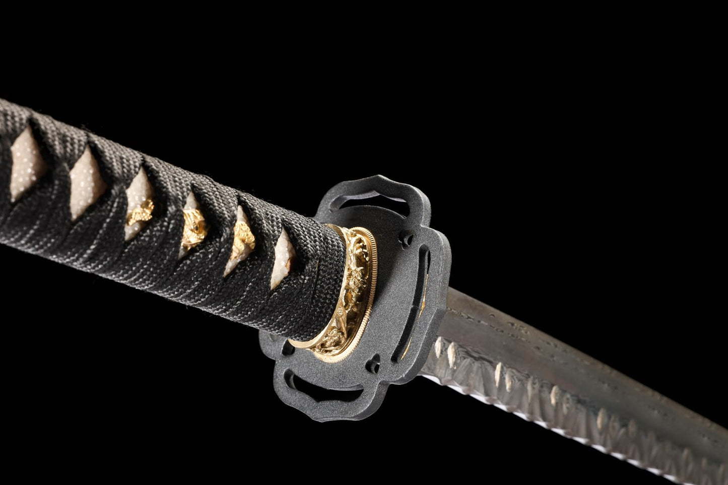 Iron tsuba and black cotton-wrapped rayskin katana grip