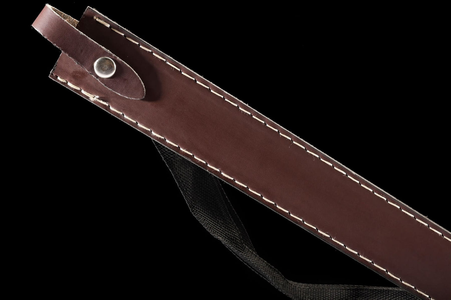 Handmade brown leather sheath with snap closure and black shoulder strap