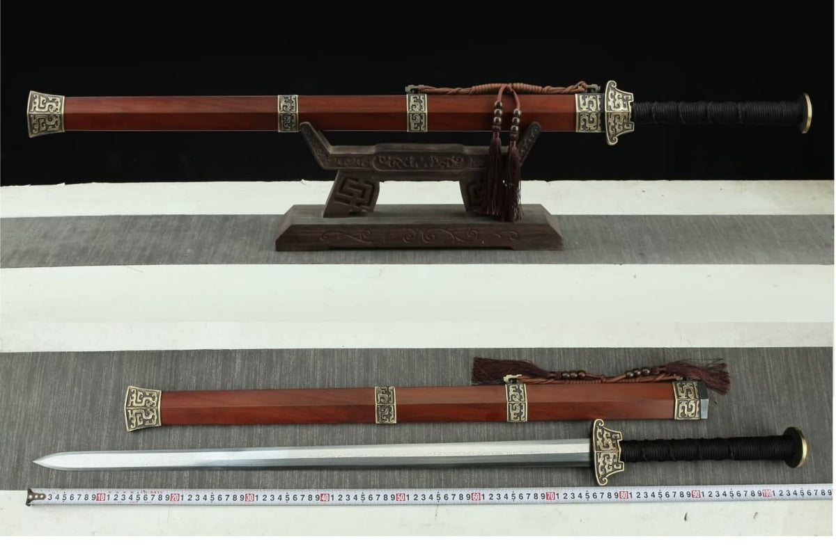 Hanwang Jian shown sheathed on a stand and unsheathed beside a metric measuring tape; stand not included