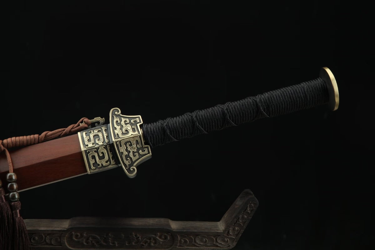 Hanwang Jian solid-wood handle wrapped in black cord, with a brass guard and round pommel