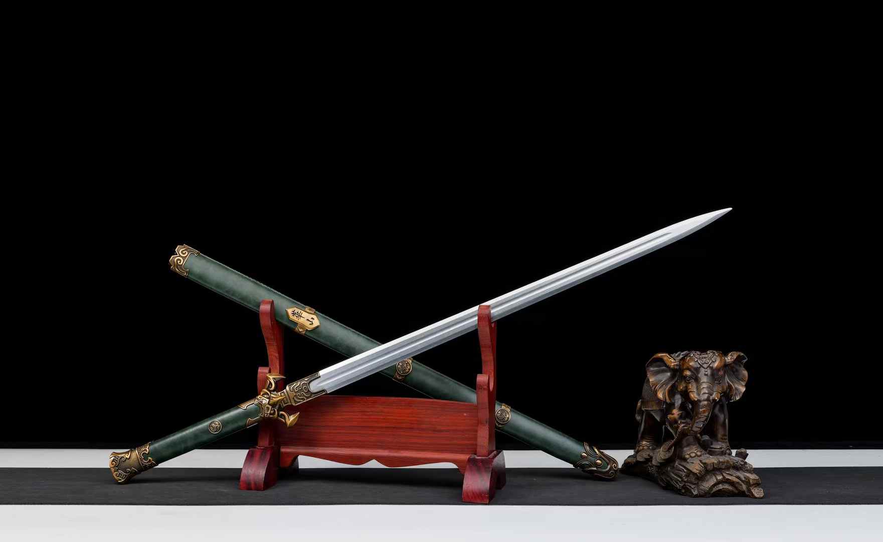 Huashan Jian blade crossed over dark green scabbard