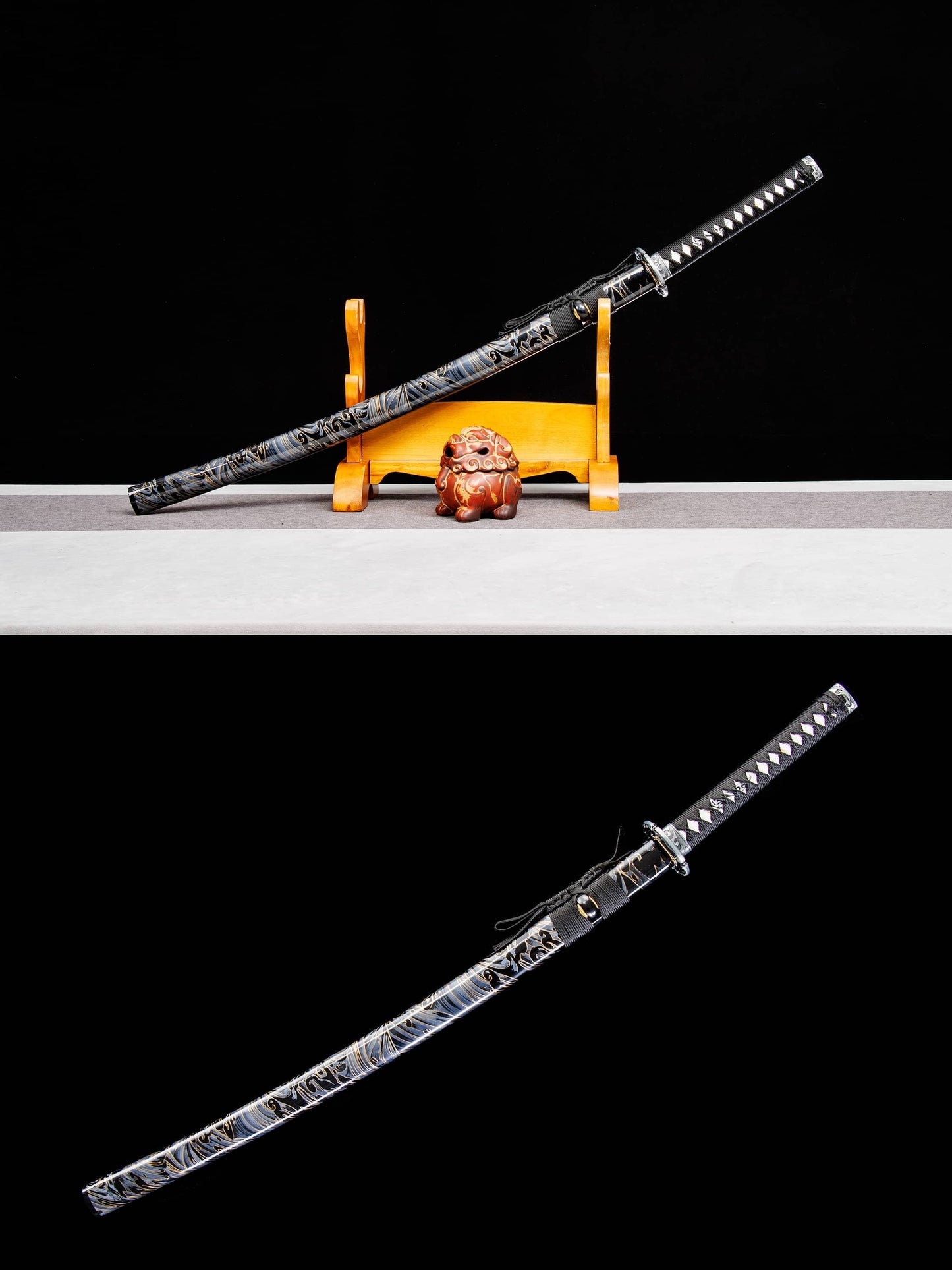 katana sword with lacquered wood saya on display stand