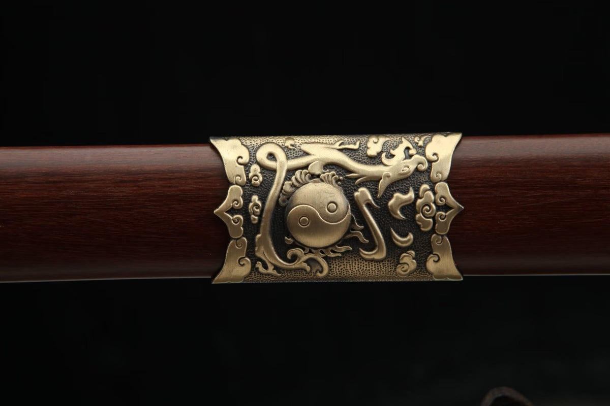 Brass dragon and Yin-Yang motif on the reddish-brown wooden Longyao Jian scabbard