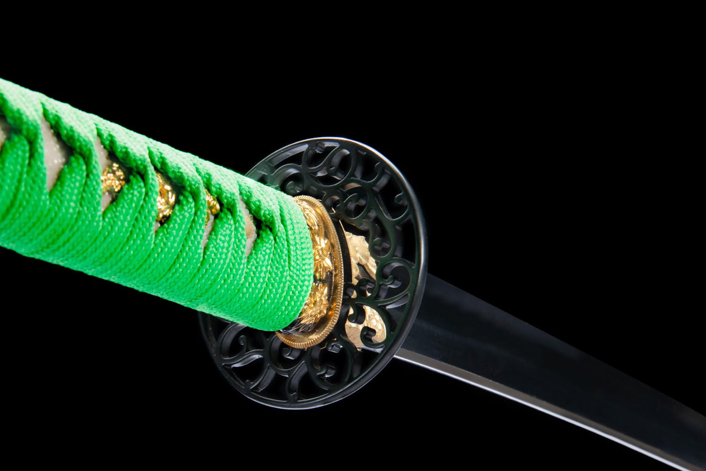 Iron openwork tsuba with black blade and green handle