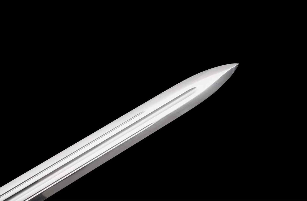 Close-up of the polished straight Qingfeng Jian blade with longitudinal grooves and pointed tip