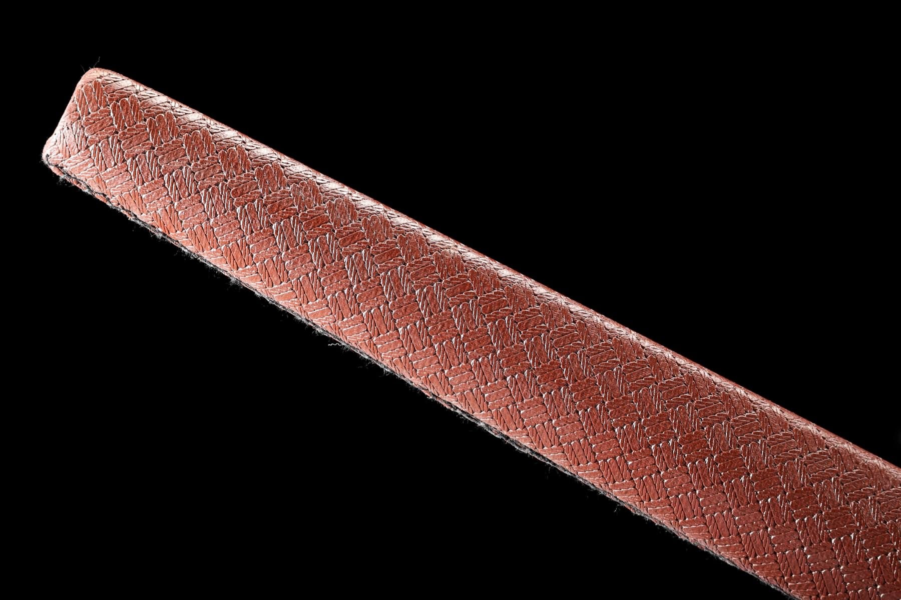 Brown scabbard weave-pattern surface detail