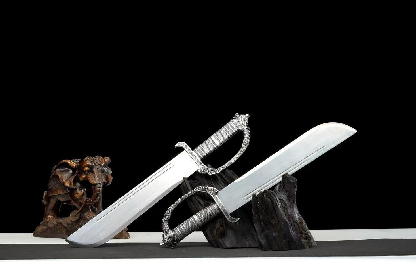 Wing Chun swords showing wide polished blade profiles